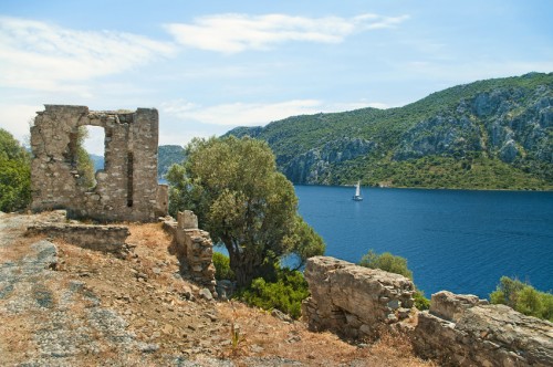 view of Aegean sea bay and mountains from ruined 12th century byzantine church wall on Camellia island, Turkey